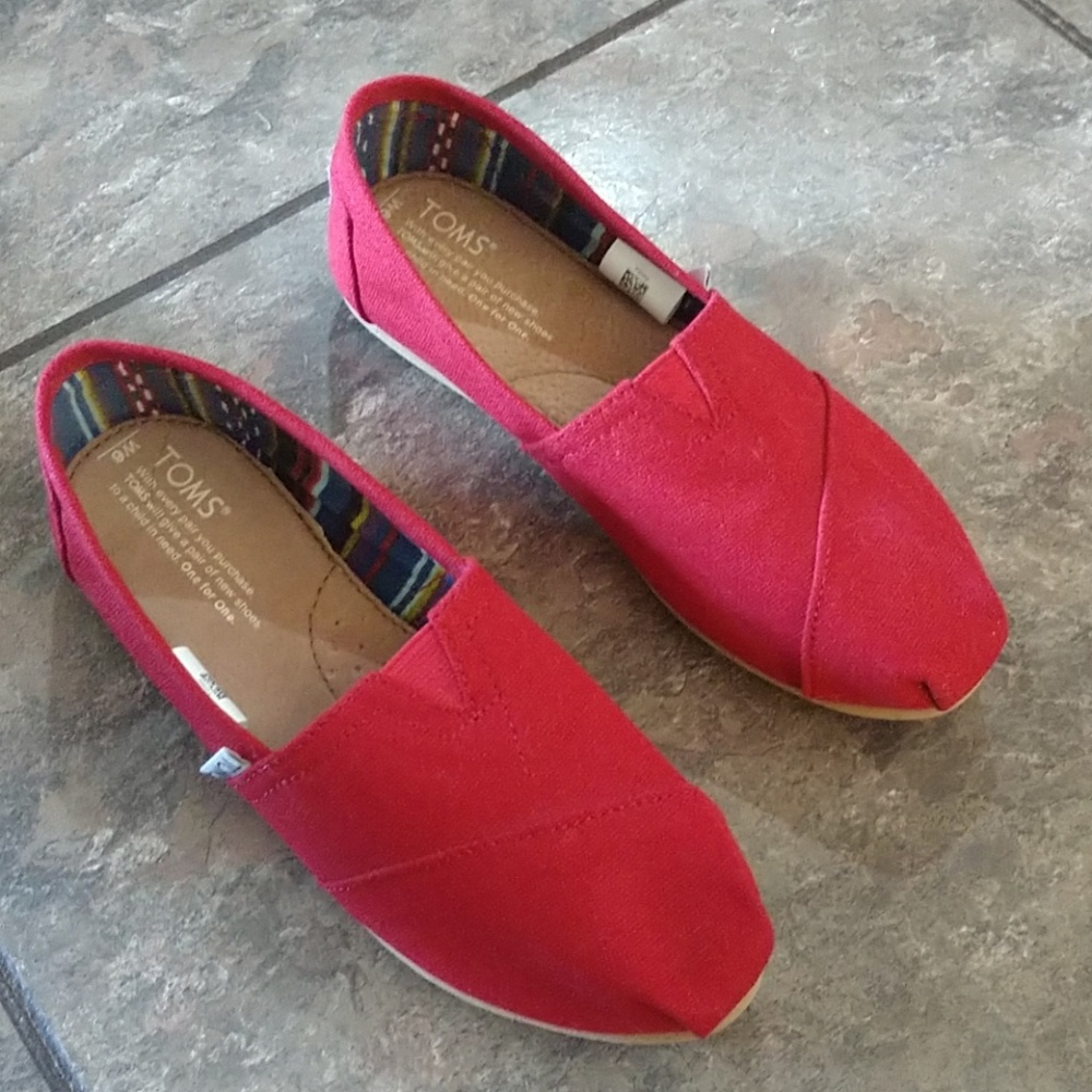 TOMS red shoes, excellent used condition. Worn only twice.